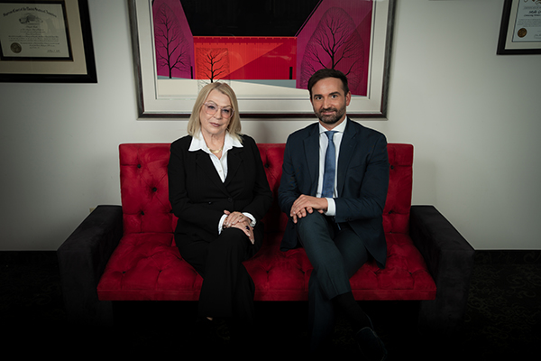 Photo of attorneys Sibylle Grebe and Lorenzo Carra Stoller